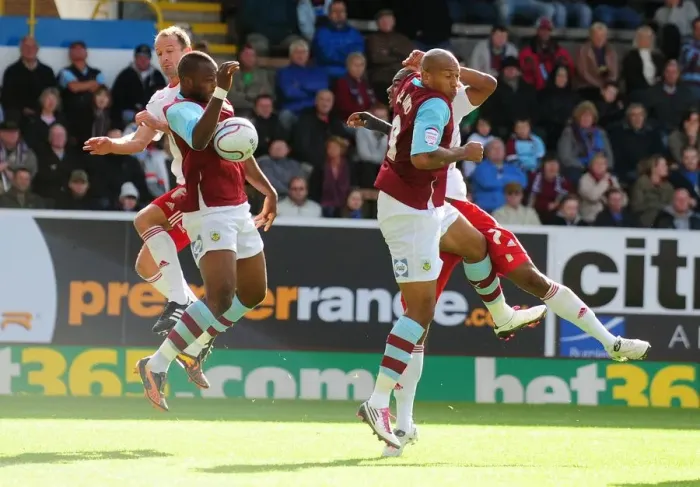 Framed Print : Burnley vs. Bristol City: Controversial Moment as Andre Bikey Handles the Ball Unnoticed by the Referee (Championship Football, 2010)