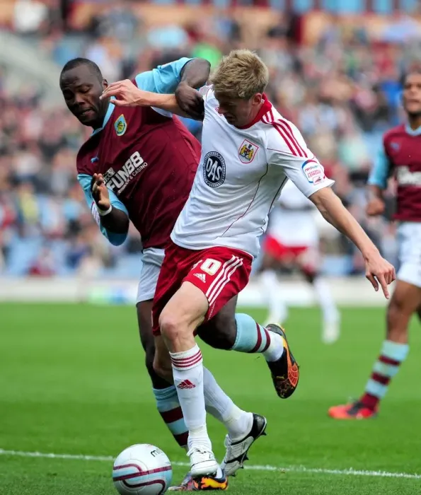 Framed Print : Burnley's Andre Bikey Fouls Jon Stead: Championship Clash Between Burnley and Bristol City, September 2010