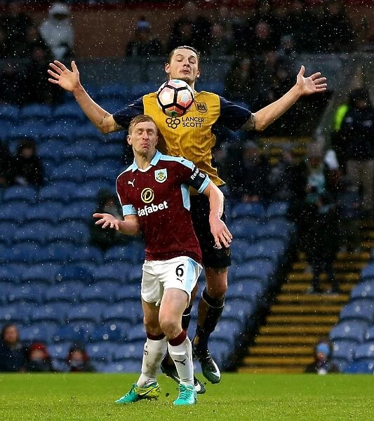 Burnley's Ben Mee Clashes with Bristol City's Milan Djuric at Turf Moor, FA Cup Fourth Round (January 2017)