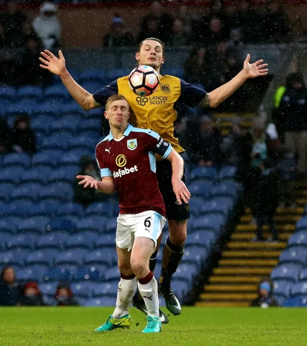 Framed Print : Burnley's Ben Mee Clashes with Bristol City's Milan Djuric at Turf Moor, FA Cup Fourth Round (January 2017) Framed Print : Burnley's Ben Mee Clashes with Bristol City's Milan Djuric at Turf Moor, FA Cup Fourth Round (January 2017)