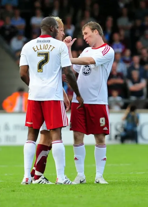 Framed Print : Calming Down the Chaos: David Clarkson Consoles Marvin Elliott During Tense Scunthorpe vs. Bristol City Championship Match, 2010 Framed Print : Calming Down the Chaos: David Clarkson Consoles Marvin Elliott During Tense Scunthorpe vs. Bristol City Championship Match, 2010