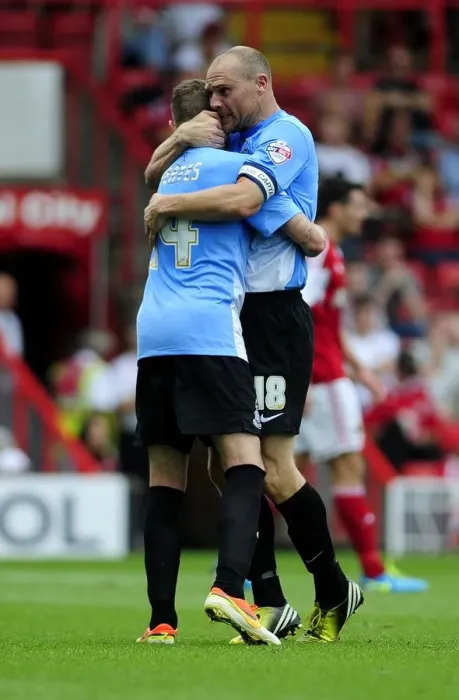 Framed Print : Celebrating the Goal: Jones and Yeates Rejoice with Nahki Wells after Scoring for Bradford City against Bristol City (August 3, 2013)