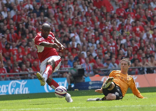 Celebrating Promotion: Dele Adebola's Triumphant Moment at the Play-Off Final