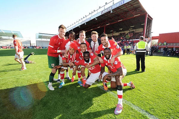 Celebrating Victory: The Excited Bristol City Squad after Securing Three Points against Coventry City, 18th April 2015