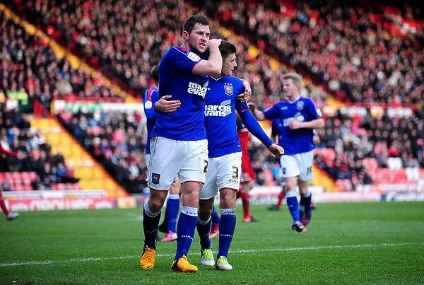 Celebrating Victory: Ipswich Town's Daryl Murphy and Team Mates Rejoice After Goal vs. Bristol City (January 2013)