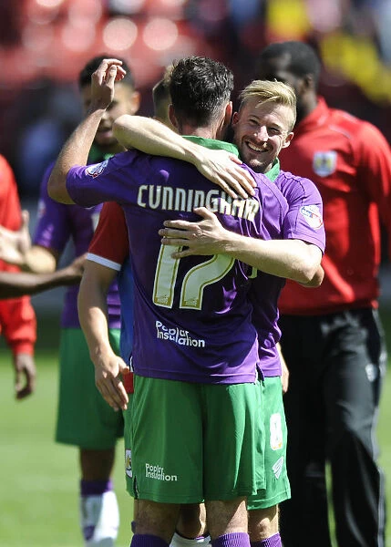 Celebrating the Win: Wade Elliott and Gregg Cunningham of Bristol City After Scoring the First Goal Against Sheffield United (09-08-2014)