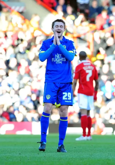 Framed Print : Celebration at Ashton Gate: McCartney and Snodgrass Rejoice Over Leeds United's Goal vs. Bristol City (Championship 2011)
