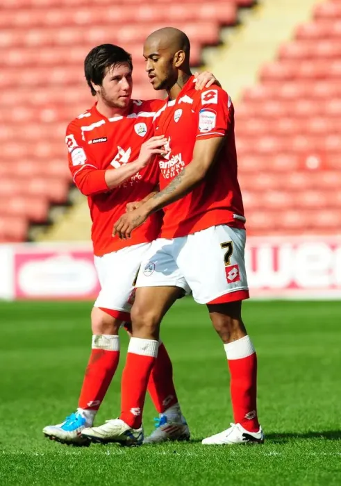 Framed Print : Celebration: Barnsley's Haynes and Butterfield Rejoice in Championship Victory over Bristol City (09 / 04 / 2011)