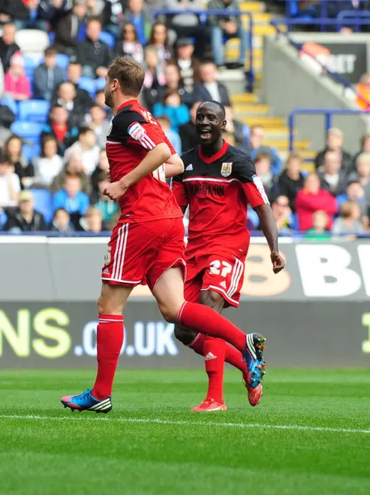 Framed Print : Celebration: Davies and Adomah Rejoice in Bristol City's Goal vs Bolton Wanderers (201012) Framed Print : Celebration: Davies and Adomah Rejoice in Bristol City's Goal vs Bolton Wanderers (201012)