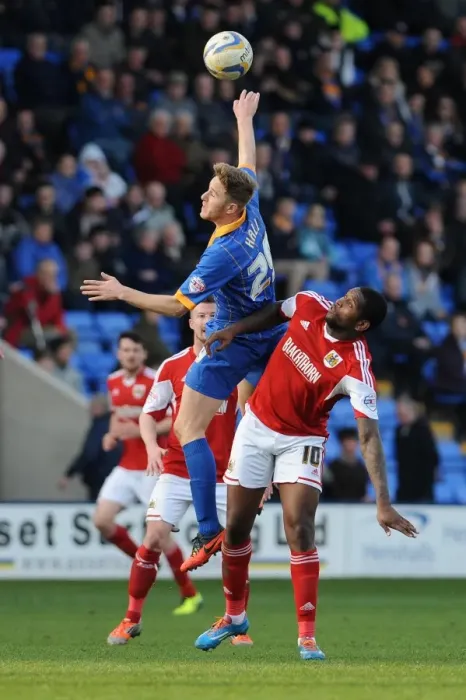 Framed Print : Challenge in the Air: Asa Hall vs. Jay Emmanuel-Thomas in Shrewsbury Town vs. Bristol City Football Match