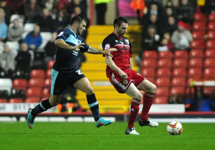 Framed Print : Challenge at Ashton Gate: Austin vs. McManus in Bristol City vs. Burnley Championship Clash Framed Print : Challenge at Ashton Gate: Austin vs. McManus in Bristol City vs. Burnley Championship Clash