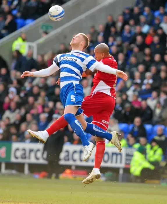 Framed Print : Challenge in the Sky: Iwelumo vs. Mills in the Thrilling Championship Clash between Reading and Bristol City Framed Print : Challenge in the Sky: Iwelumo vs. Mills in the Thrilling Championship Clash between Reading and Bristol City