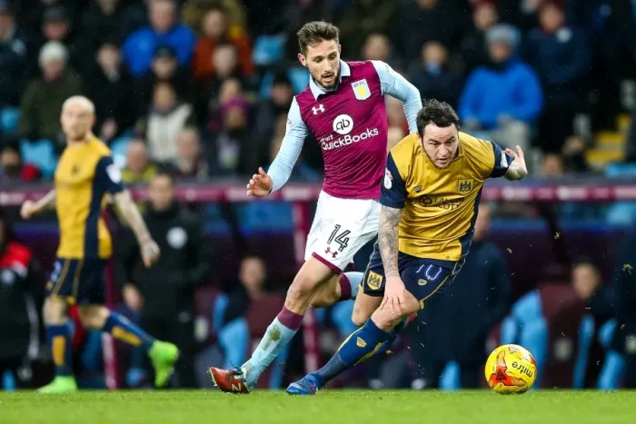 Framed Print : Challenge at Villa Park: Lee Tomlin vs Conor Hourihane in Aston Villa vs Bristol City Championship Clash Framed Print : Challenge at Villa Park: Lee Tomlin vs Conor Hourihane in Aston Villa vs Bristol City Championship Clash