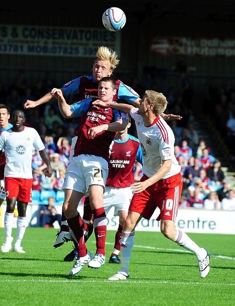 Challenging for Aerial Supremacy: Wright vs. Stead in Scunthorpe United vs. Bristol City Championship Clash (September 11, 2010)