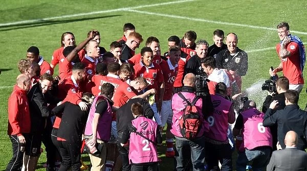 Champagne-Fueled Celebrations: Bristol City's Victory Over Coventry City at Ashton Gate Stadium (April 2015)