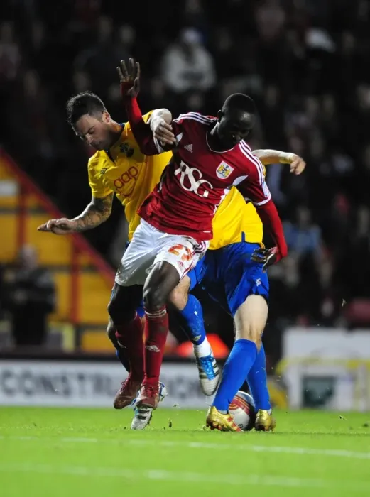 Framed Print : Championship Clash: Albert Adomah vs. Danny Fox - Bristol City vs. Southampton, 26th November 2011 Framed Print : Championship Clash: Albert Adomah vs. Danny Fox - Bristol City vs. Southampton, 26th November 2011