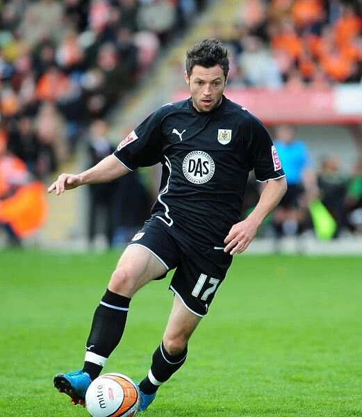 Championship Clash: Ivan Sproule of Bristol City Faces Blackpool at Bloomfield Road, 2010