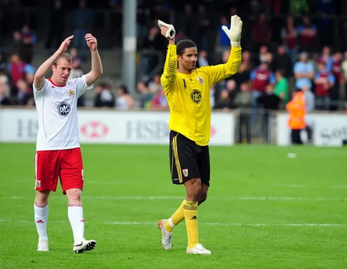 Framed Print : Championship Glory: David James and David Clarkson's Emotional Reunion after Bristol City's Victory over Scunthorpe United (September 11, 2010)