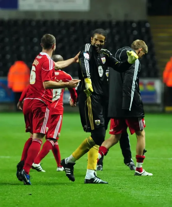 Framed Print : Championship Glory: David James and Louis Carey's Emotional Reunion after Bristol City's Victory over Swansea City (10 / 11 / 2010) Framed Print : Championship Glory: David James and Louis Carey's Emotional Reunion after Bristol City's Victory over Swansea City (10 / 11 / 2010)
