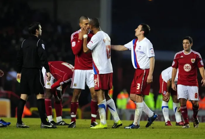 Framed Print : Championship Rivalry: Caulker vs. Andrews Clash at Ashton Gate, 2010