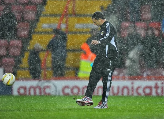 Framed Print : Championship Showdown Abandoned: Derek McInnes Examines Floodlit Pitch as Referee Halts Bristol City vs. Watford Match Framed Print : Championship Showdown Abandoned: Derek McInnes Examines Floodlit Pitch as Referee Halts Bristol City vs. Watford Match