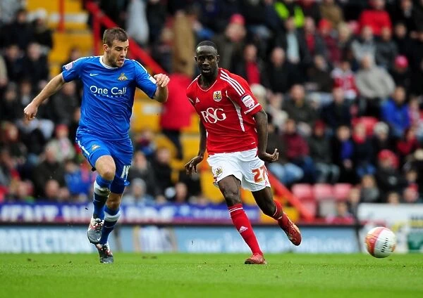 Championship Showdown: Albert Adomah vs Tommy Spurr - A Battle for Supremacy in Bristol City vs Doncaster Rovers, 21st January 2012