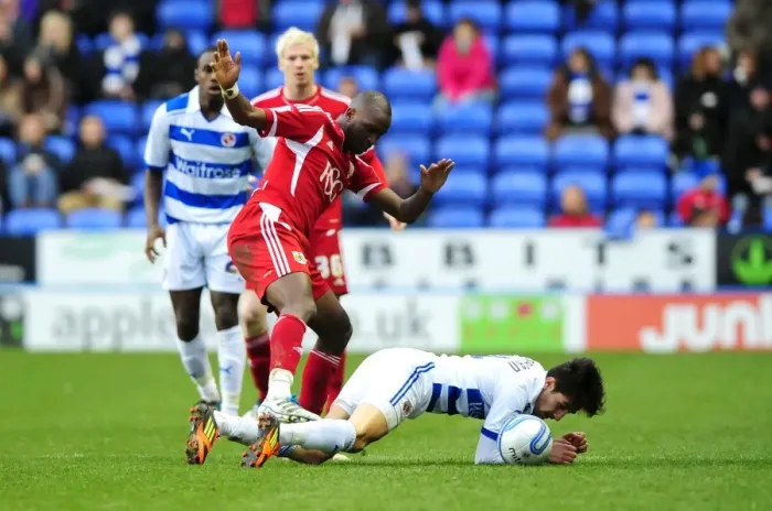 Framed Print : Championship Showdown: Cisse vs. Karacan - Battle for the Ball, Reading v Bristol City, 28 / 01 / 2012