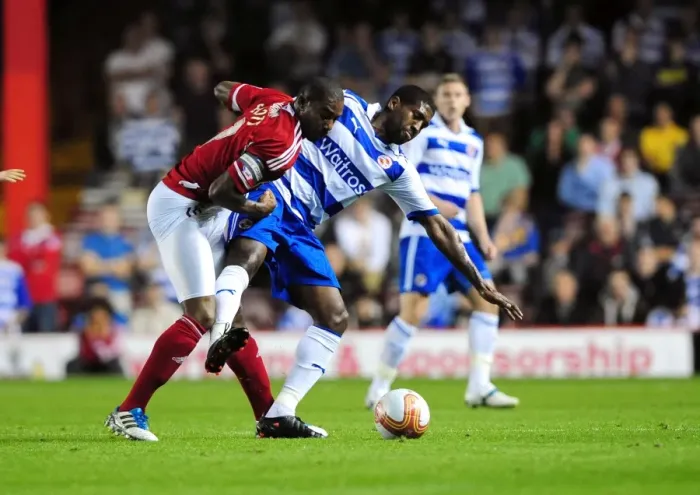 Framed Print : Championship Showdown: Elliott vs. Leigertwood - September 2011 - Marvin Elliott of Bristol City and Mikele Leigertwood of Reading Go Head-to-Head