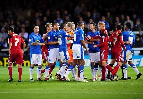 Championship Showdown: Intense Moment as Players Clash Between Peterborough and Bristol City