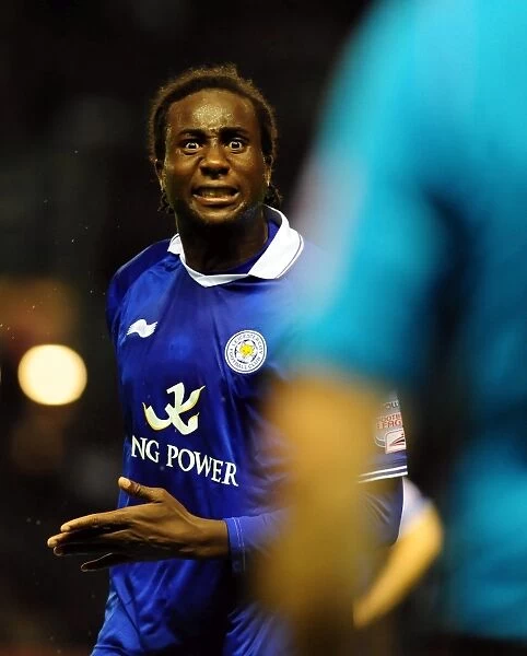 Championship Showdown: Leicester City's Souleymane Bamba Argues with Referee Assistant during Leicester City vs. Bristol City Match on August 6, 2011