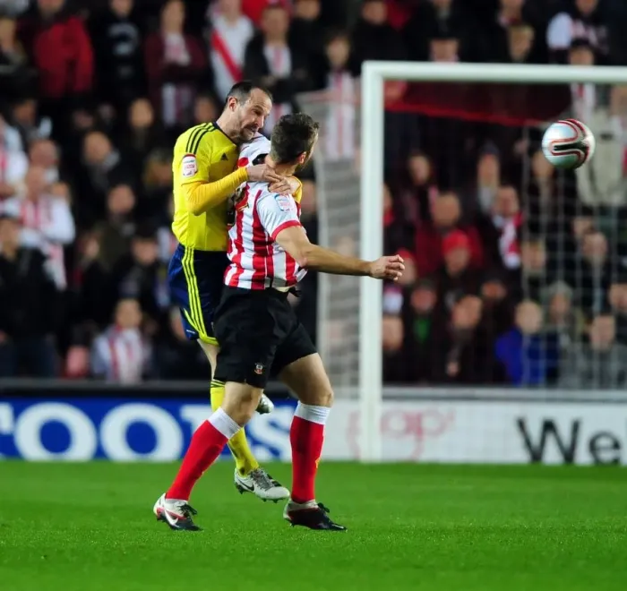 Framed Print : Championship Showdown: Louis Carey vs. Rickie Lambert - A Battle for Dominance at St. Mary's Stadium (December 30, 2011) Framed Print : Championship Showdown: Louis Carey vs. Rickie Lambert - A Battle for Dominance at St. Mary's Stadium (December 30, 2011)