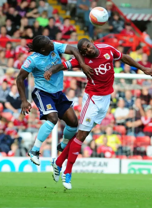 Framed Print : Championship Showdown: Marvin Elliott vs. Aaron Mclean - September 2011 - Bristol City vs. Hull City Framed Print : Championship Showdown: Marvin Elliott vs. Aaron Mclean - September 2011 - Bristol City vs. Hull City