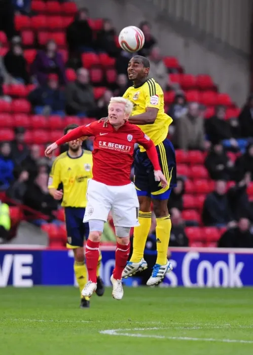 Framed Print : Championship Showdown: Marvin Elliott vs. David Perkins - Bristol City vs. Barnsley, 2011