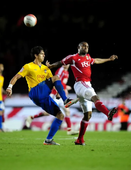 Framed Print : Championship Showdown: Marvin Elliott vs. Jose Fonte at Ashton Gate Stadium (November 26, 2011)