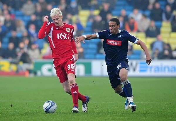 Championship Showdown: McGivern vs. Feeney - Bristol City's Ryan McGivern Battles for the Ball against Liam Feeney of Millwall, 2011