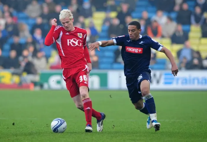 Framed Print : Championship Showdown: McGivern vs. Feeney - Bristol City's Ryan McGivern Battles for the Ball against Liam Feeney of Millwall, 2011