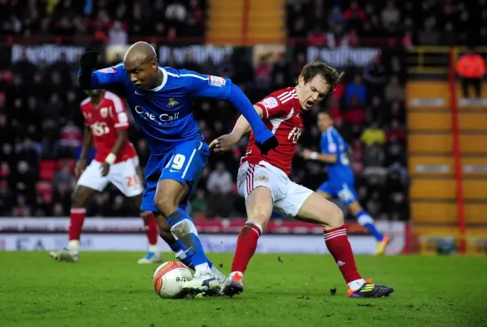Framed Print : Championship Showdown: Neil Kilkenny vs El-Hadji Diouf - A Fight for Possession, Bristol City vs Doncaster Rovers, 21st January 2012 Framed Print : Championship Showdown: Neil Kilkenny vs El-Hadji Diouf - A Fight for Possession, Bristol City vs Doncaster Rovers, 21st January 2012
