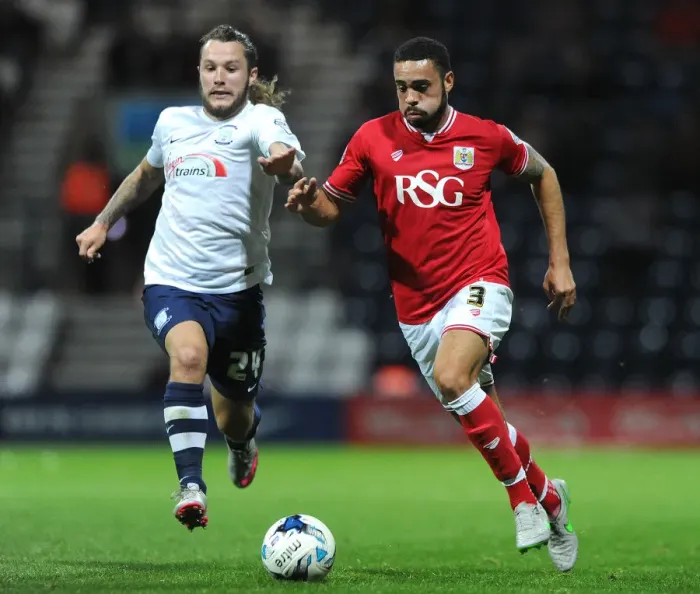 Framed Print : Chasing Glory: Derrick Williams vs. Stevie May at Deepdale Stadium Framed Print : Chasing Glory: Derrick Williams vs. Stevie May at Deepdale Stadium
