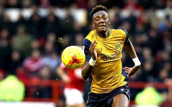 Chasing Glory: Tammy Abraham Pursues the Ball in Nottingham Forest vs. Bristol City Clash, January 2017