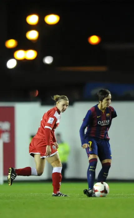Framed Print : Chasing Greatness: Loren Dykes of Bristol Academy Pursues FC Barcelona's Marta Corredera in Womens Champions League