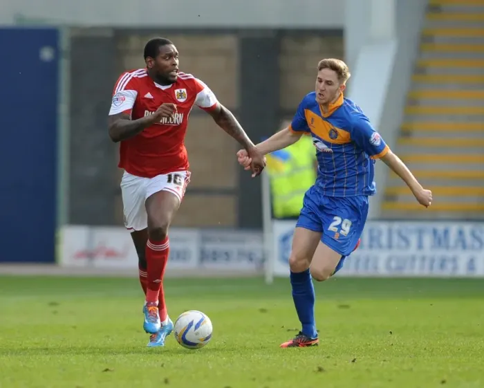 Framed Print : Chasing the Win: Intense Moment as Asa Hall of Shrewsbury Town Pursues Jay Emmanuel-Thomas of Bristol City Framed Print : Chasing the Win: Intense Moment as Asa Hall of Shrewsbury Town Pursues Jay Emmanuel-Thomas of Bristol City