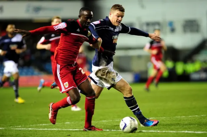 Framed Print : Chasing the Win: Intense Moment as Millwall's Shane Lowry Chases Down Albert Adomah of Bristol City Framed Print : Chasing the Win: Intense Moment as Millwall's Shane Lowry Chases Down Albert Adomah of Bristol City