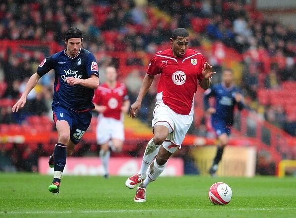 Chasing the Win: Marvin Elliott vs. George Boyd in the Intense Championship Clash between Bristol City and Nottingham Forest (03 / 04 / 2010)