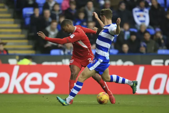 Framed Print : Chris Gunter's Tense Cross under Pressure during Reading vs. Bristol City Championship Match Framed Print : Chris Gunter's Tense Cross under Pressure during Reading vs. Bristol City Championship Match