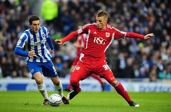 Chris Wood vs. Lewis Dunk: Intense Battle for the Ball in Championship Clash between Brighton and Bristol City - 14 / 01 / 2012