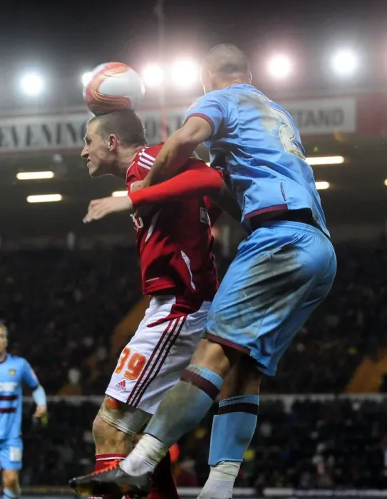 Framed Print : Chris Wood vs. Winston Reid: Aerial Battle at Ashton Gate Stadium - Bristol City vs. West Ham, 2012
