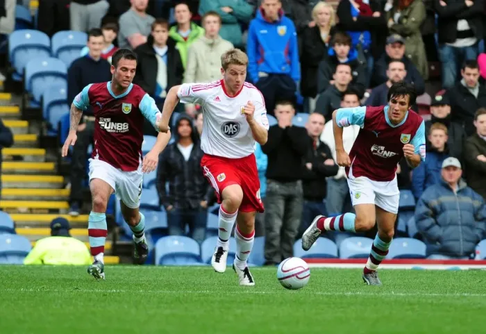 Framed Print : Christian Ribeiro's Late Rush: A Thrilling Moment from Burnley v Bristol City Championship Clash (2010)