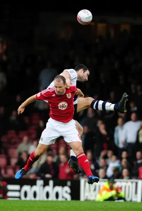 Framed Print : Clash in the Air: Craig Morgan Outjumps Louis Carey in Championship Showdown - Bristol City vs Preston North End (06 / 11 / 2010)