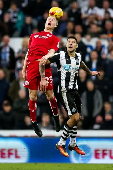 Framed Print : Clash in the Air: Hordur Magnusson vs. Aleksandar Mitrovic - Newcastle United vs. Bristol City, 2017