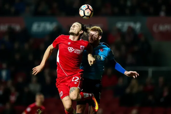 Framed Print : Clash in the Air: Milan Djuric vs. Cian Bolger - Bristol City vs. Fleetwood Town, FA Cup Third Round